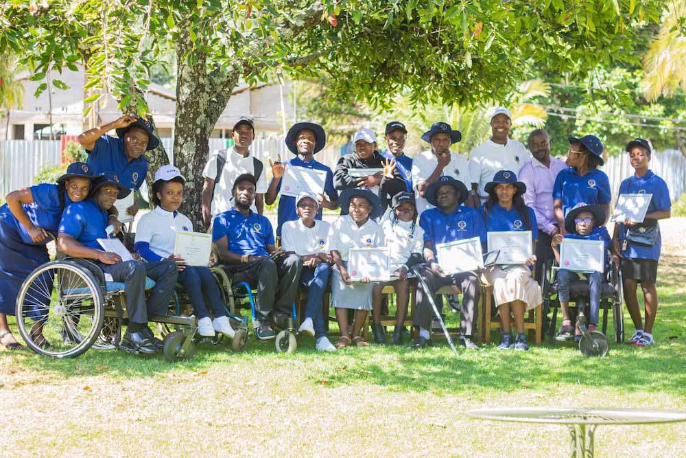 A group of people from a Zimbabwe Chapter training for people with disabilities